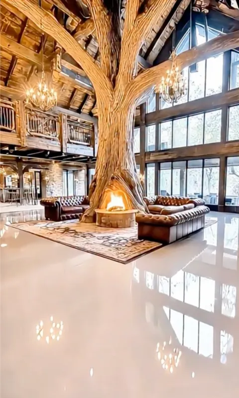 Cream high-gloss epoxy floor in a lodge-style great room